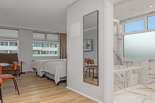 Twin Studio with Sofa Bed and Bathtub | In-room safe, laptop workspace, blackout drapes, soundproofing