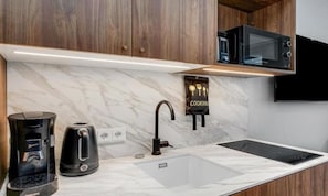 In-room safe, laptop workspace, blackout curtains, iron/ironing board