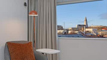 In-room safe, laptop workspace, blackout drapes, soundproofing