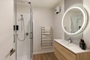 Shower, hair dryer, towels, soap