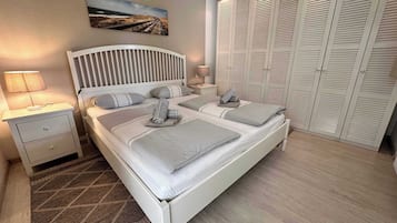 2 bedrooms, travel crib, WiFi, bed sheets