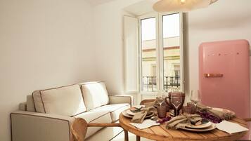 Apartament Deluxe, balcó, vistes a la ciutat | Menjador