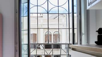 Departamento Deluxe, balcón, vista a la ciudad | Insonorización, tabla de planchar con plancha y wifi gratis