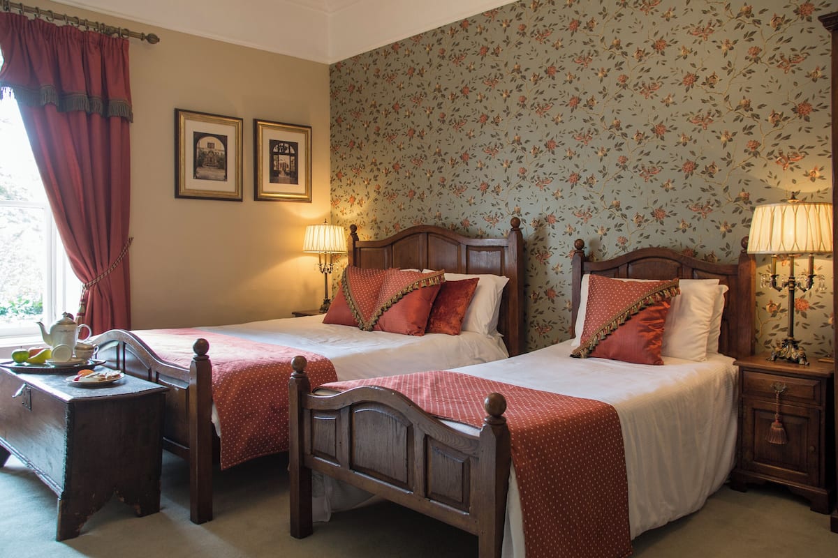 Superior Triple Room, Garden View | In-room safe, iron/ironing board, free WiFi, individually decorated