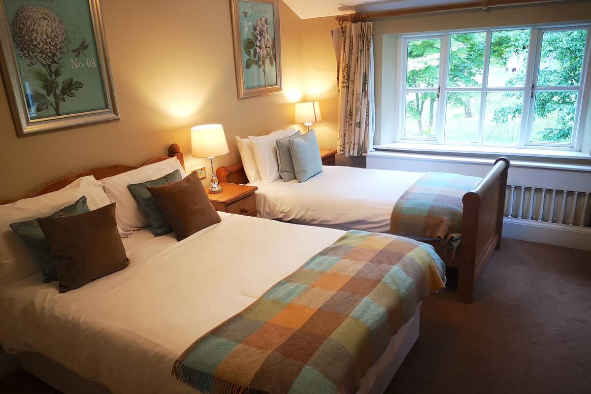 Classic Triple Room, Garden View | In-room safe, iron/ironing board, free WiFi, individually decorated
