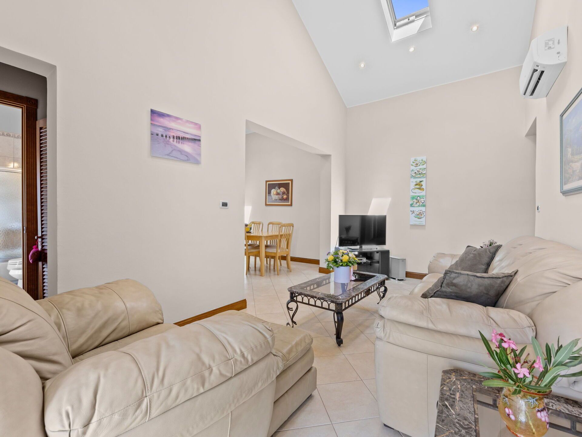 Furniture, Interior Design, Flooring, Couch, Floor, Ceiling, Room, Living Room, Table, Lighting