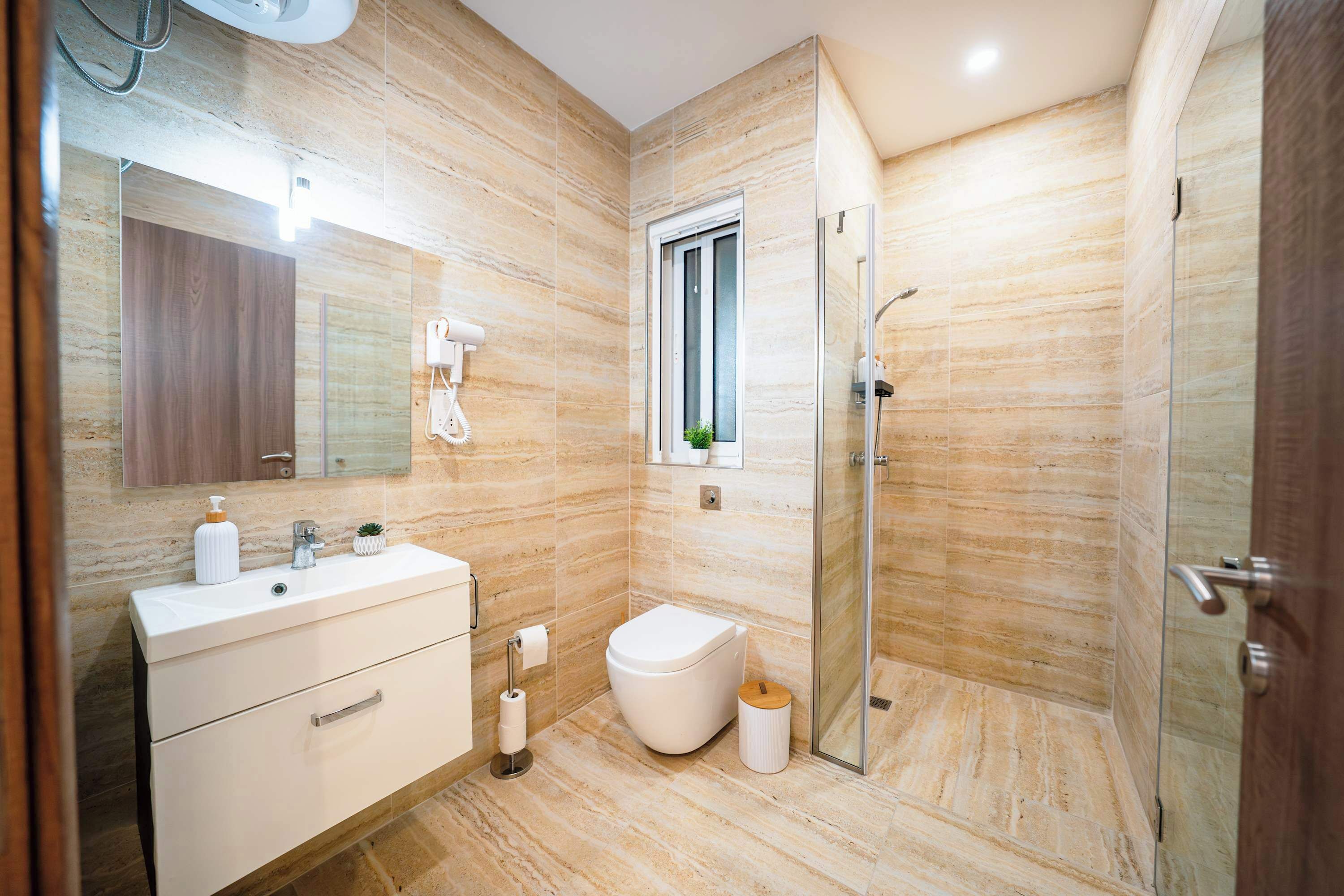 Shower, free toiletries, hair dryer, towels