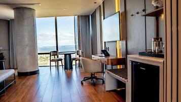 Suite, River View | Living area | 55-inch Smart TV with digital channels