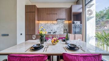 Superior Villa | Private kitchen | Fridge, oven, stovetop, dishwasher