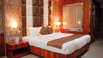Luxury Double Room, City View | Memory-foam beds, minibar, desk, laptop workspace