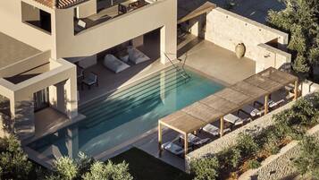 Villa exclusiva, vistas a la piscina | Caja fuerte, cortinas opacas, sistema de insonorización