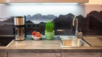 Fridge, microwave, stovetop, coffee/tea maker