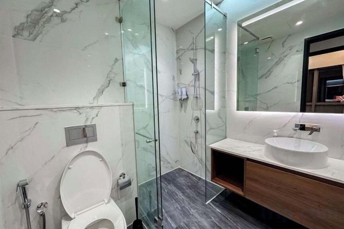 Bathroom | Hair dryer, slippers, towels, soap