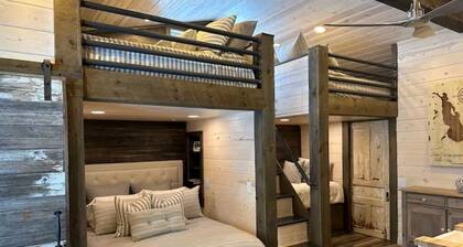 Sunset Cottage on Lake Wapogasset, Amery WI with Bunk Room, Hot Tub, AC, & more