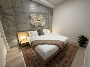 2 bedrooms, desk, iron/ironing board, travel crib