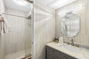 Shower, hair dryer, towels
