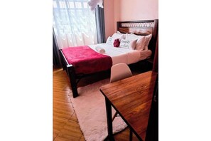 2 dormitorios, tabla de planchar con plancha, wifi y ropa de cama
