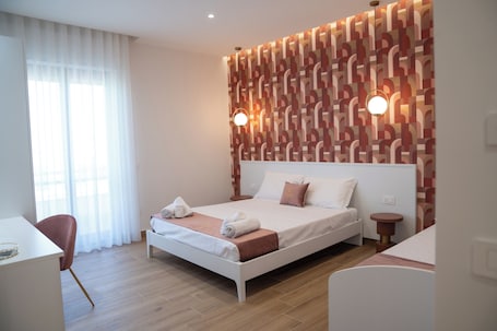 Family Triple Room | Desk, free WiFi