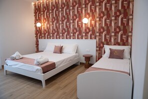 Family Triple Room | Desk, free WiFi