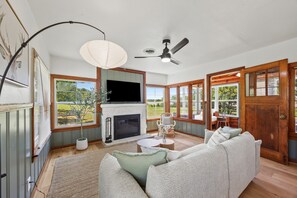 Smart TV, fireplace, table football, books