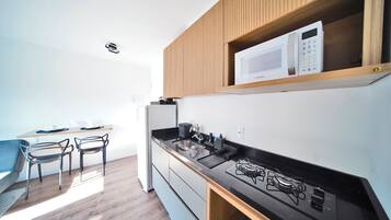 Comfort Room | Private kitchen | Fridge, microwave, stovetop, toaster