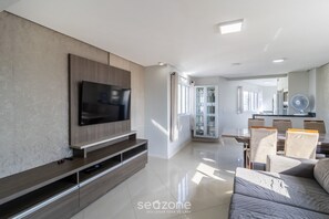 Basic Apartment | Living area | TV -  Apartment with bathtub near the beach YVD1301 (Balneário Camboriú)