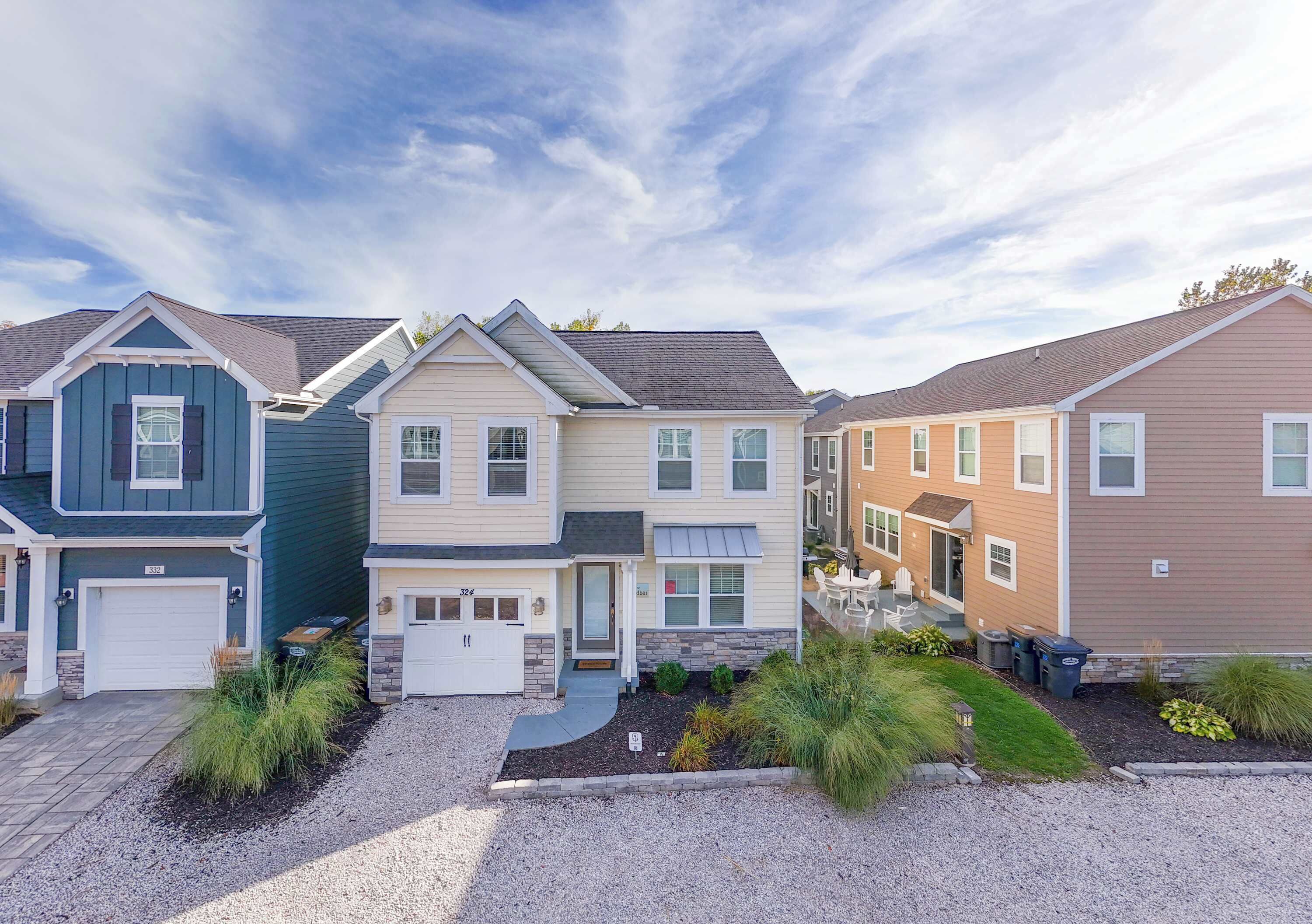 Welcome to the Sandbar! A spacious dog friendly home in South Haven that sleeps 16.  Located in the Harbor Club neighborhood, guests have access to two pools! 