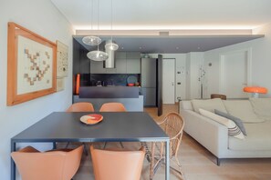 Apartment (1 Bedroom) | Living area | 32-inch Smart TV with cable channels