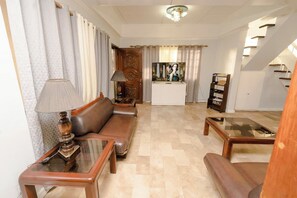 Living area - House B 3BR w/arcade fooseball along Commonwealth (Quezon City)