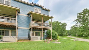 A two-story building with a covered porch and a small deck. - 1 Mi to Wisp Resort: Hot Tub Haven in Mchenry! (McHenry)