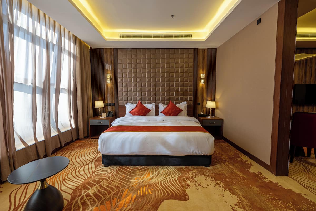 Suite Deluxe, vue sur la ville | Draps en coton égyptien, literie de qualité