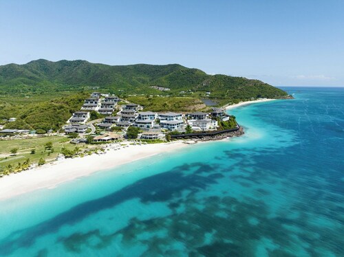 Unwind in Style at This Enchanting Seafront Villa Escape with 2 Bedrooms