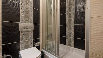 Shower, jetted tub, hair dryer, bidet