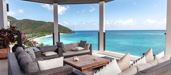 Vibrant Beachside Retreat Near Ffryes Beach with Breathtaking Sunsets Daily