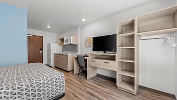 Suite, 1 Queen Bed, Non Smoking | Desk, laptop workspace, free WiFi, bed sheets