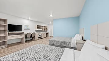 Suite, 2 queensize bedden, toegankelijk voor mindervaliden, niet-roken | Een bureau, een laptopwerkplek, gratis wifi, beddengoed