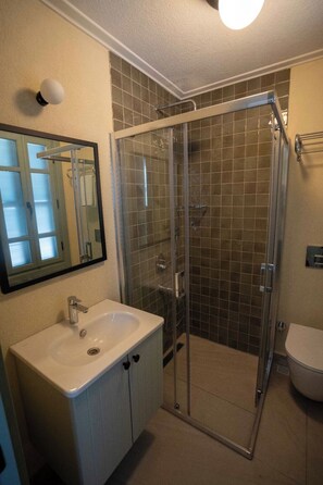 Quarto casal, vista para o jardim | Área de estar
