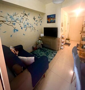 Appart'hôtel, 2 chambres, accessible aux personnes à mobilité réduite, fumeur | Salle de séjour