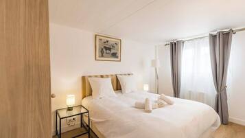 3 habitaciones, tabla de planchar con plancha, wifi y ropa de cama