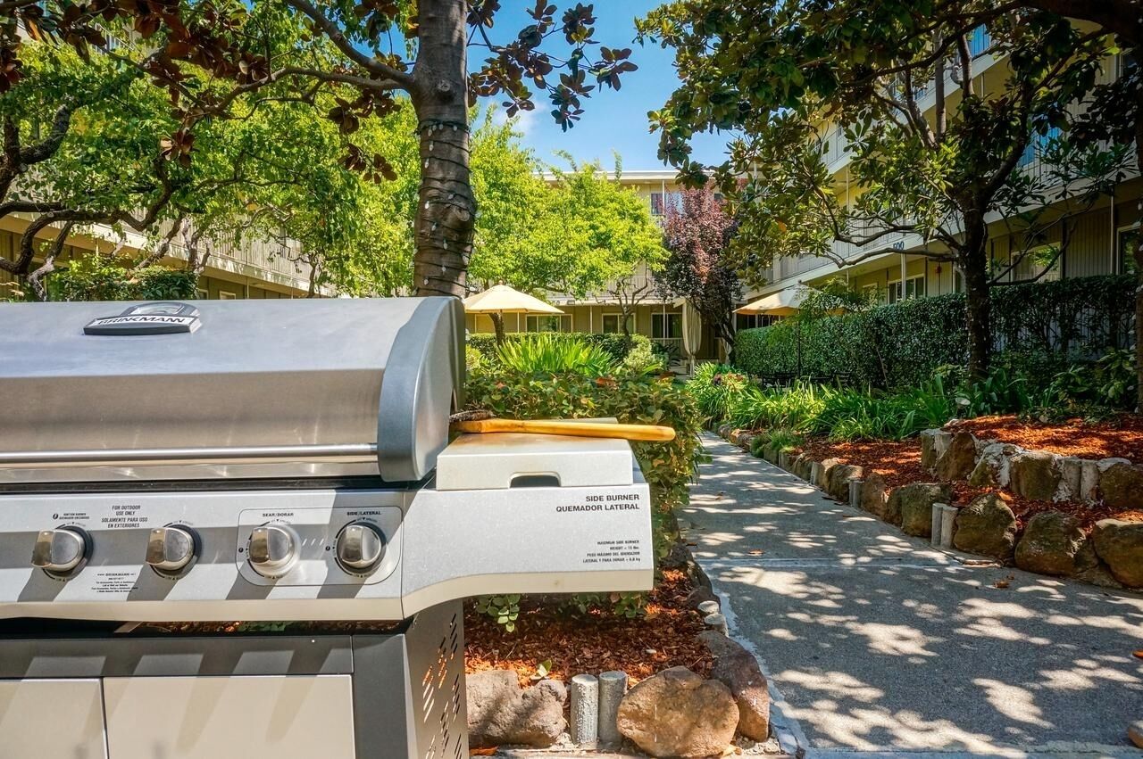 Gather for sunny cookouts on the shared garden grill.
