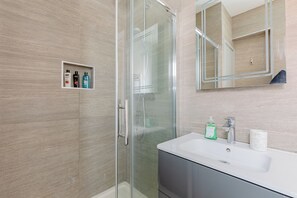 Shower, hair dryer, shampoo