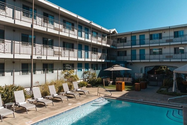 Soak up sunshine beside the sparkling pool and loungers.