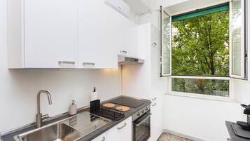 Apartamento | Cozinha privada | Micro-ondas