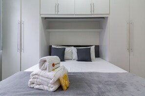 1 bedroom, desk, iron/ironing board, travel crib
