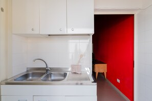 Fridge, stovetop, cookware/dishes/utensils, spices