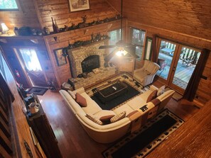 TV, fireplace, books