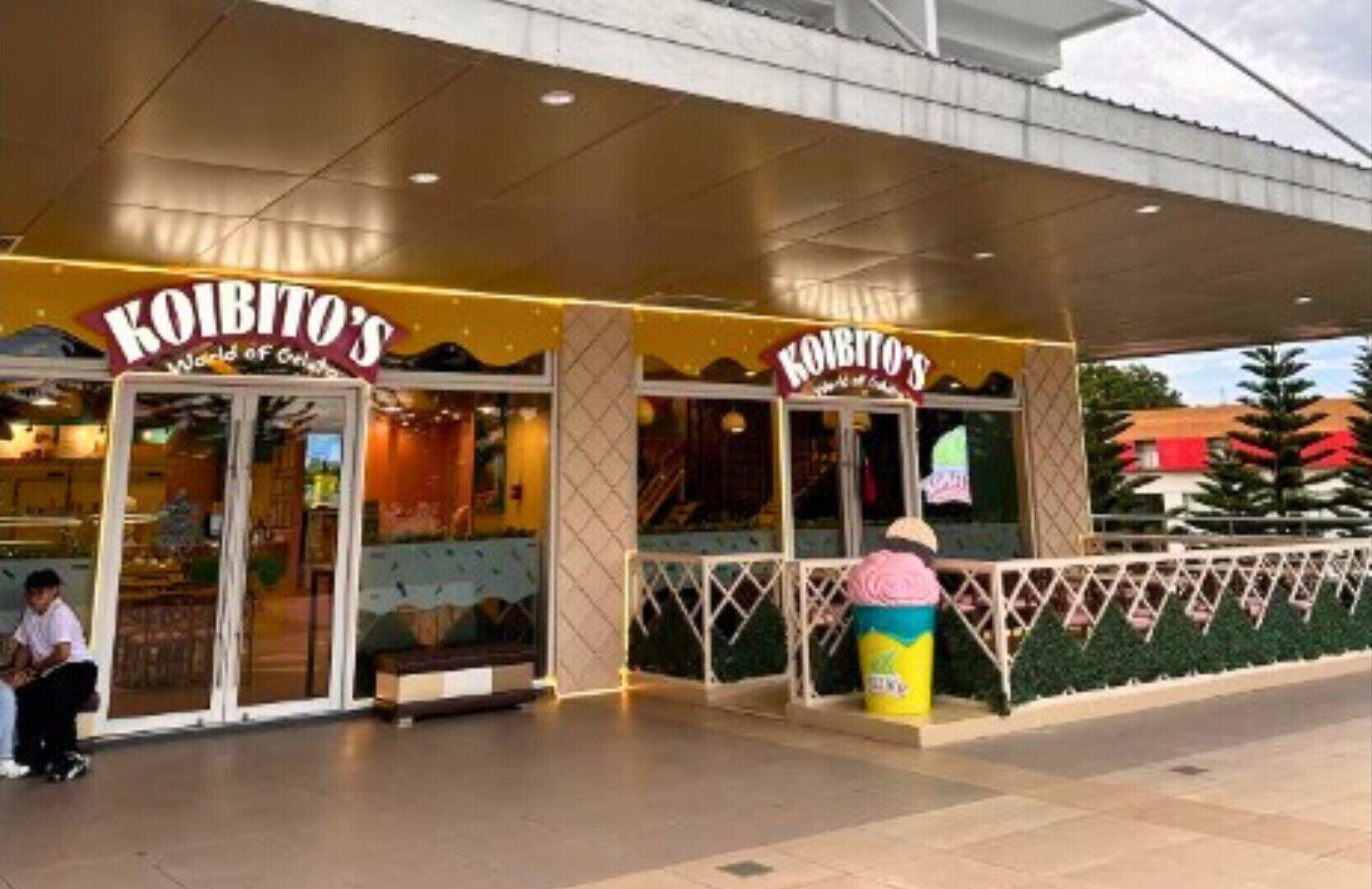 The exterior of a building with a sign that reads "Koibito's World of Ice Cream".