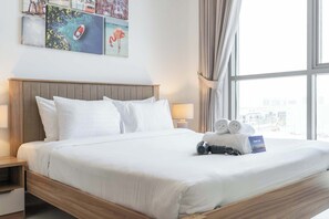 1 dormitorio, tabla de planchar con plancha, wifi y ropa de cama