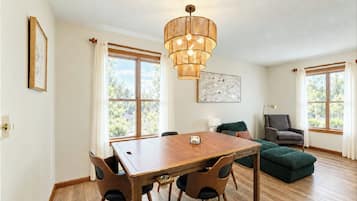 Gather around this versatile dining and game table, perfect for enjoying meals, playing board games, or sharing quality time with family and friends. A great space for making memories during your Downtown Hamilton getaway!