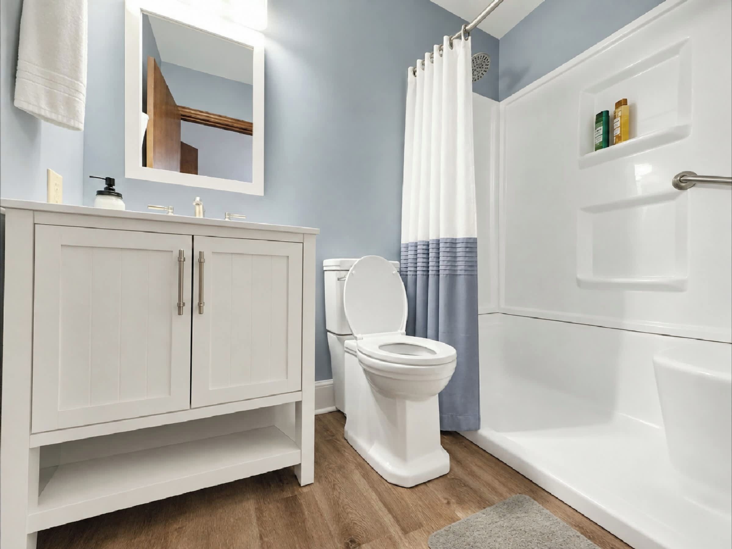 Enjoy the privacy and convenience of your primary ensuite bathroom, featuring a stylish vanity, modern walk-in shower, sleek fixtures, and bright, updated finishes for a refreshing start to your day.